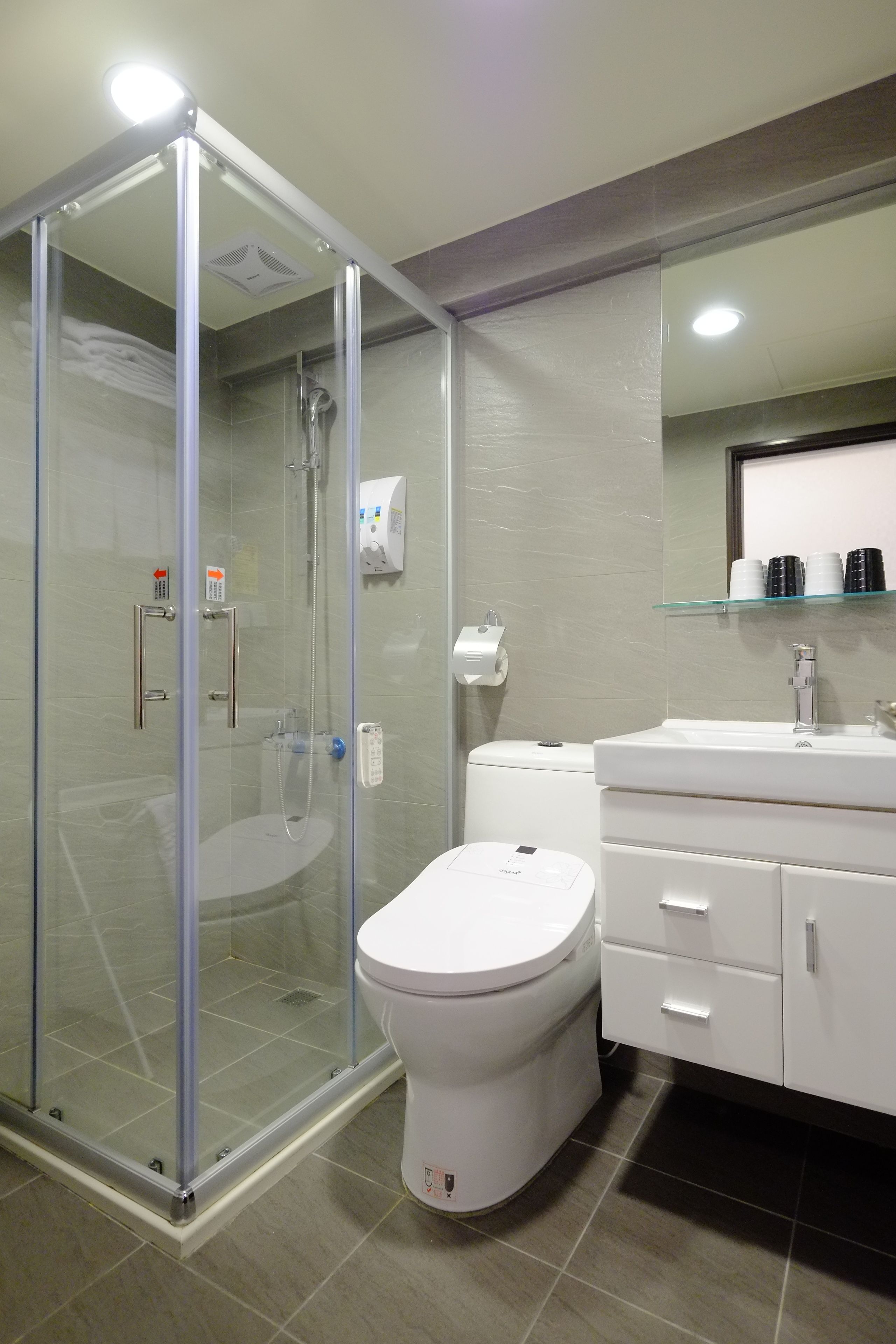 business single room, no windows | bathroom shower