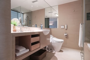 Eco-friendly toiletries, hair dryer, slippers, towels