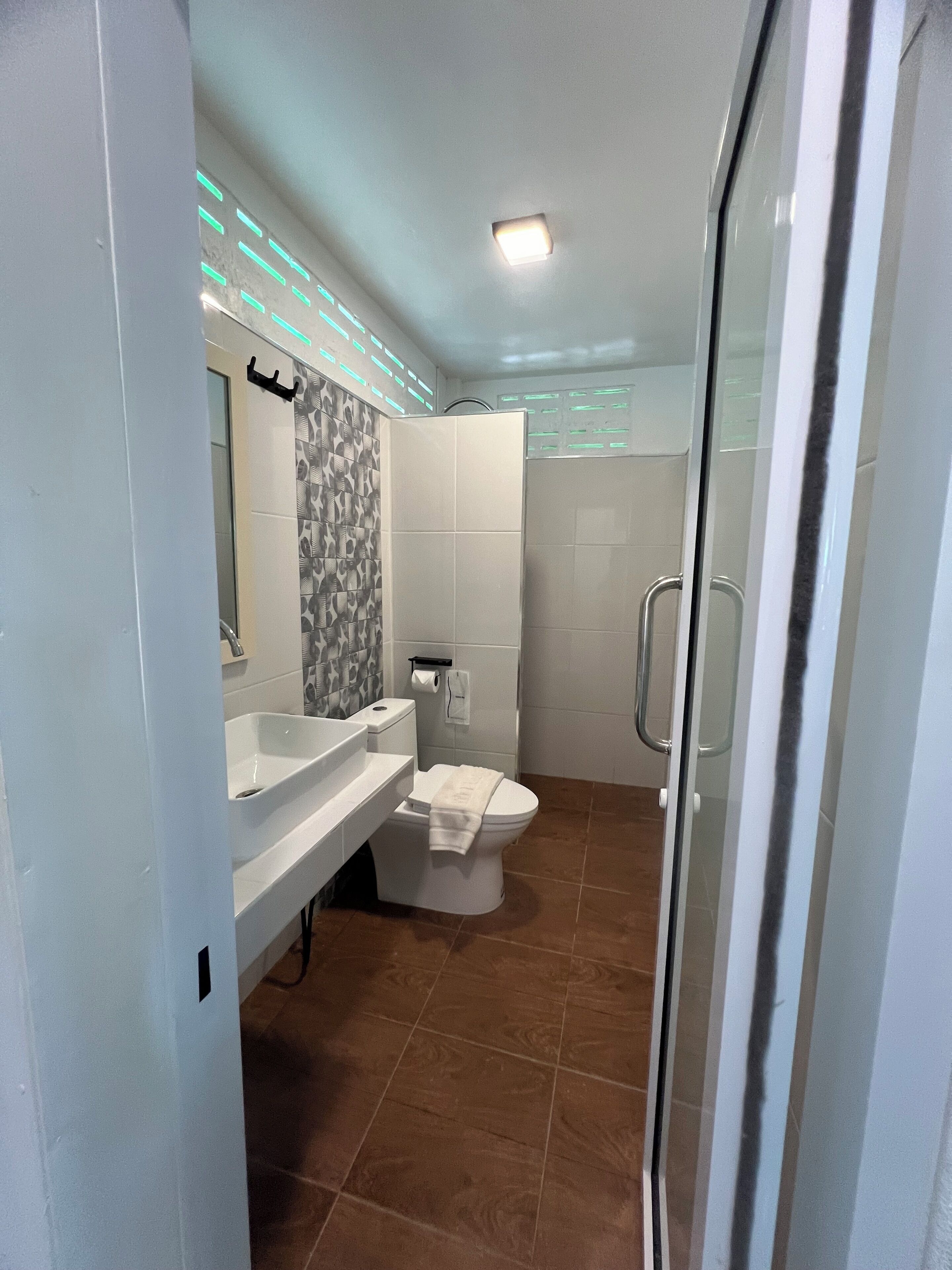 standard bungalow, terrace, garden view | bathroom | shower, free toiletries, hair dryer, towels