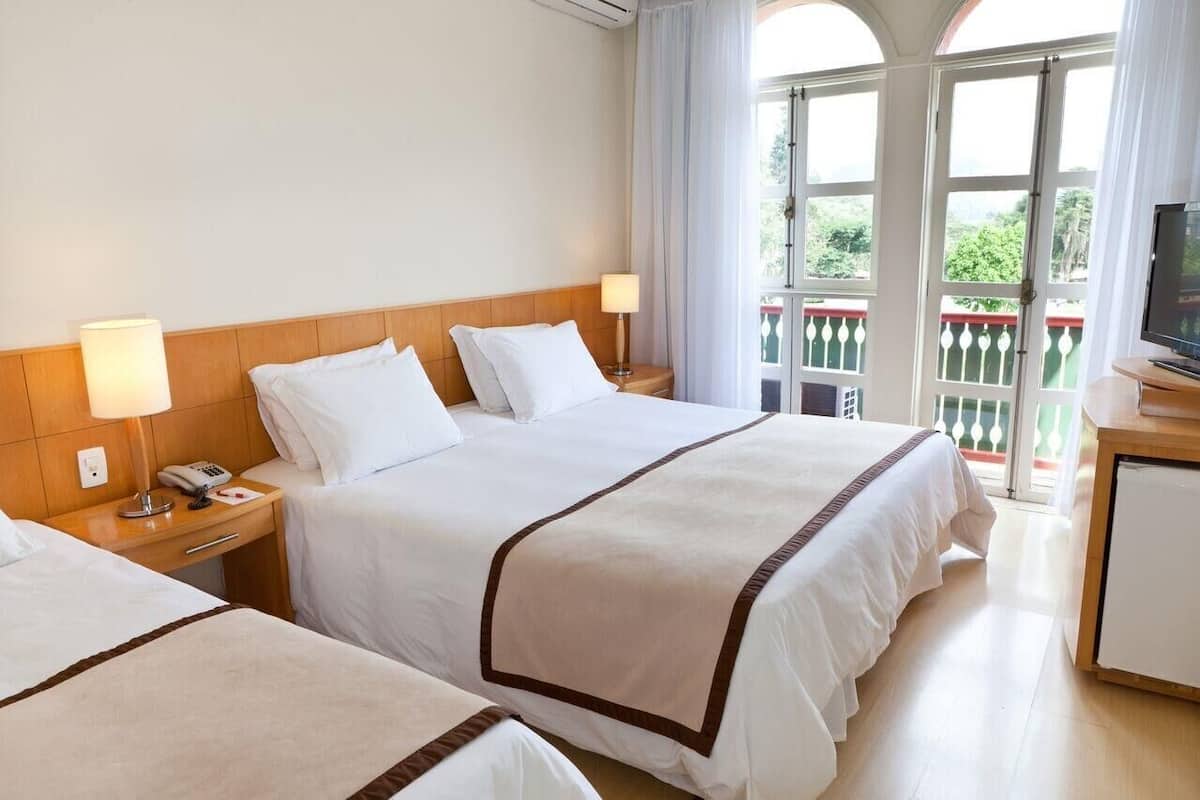 Hypo-allergenic bedding available, minibar, in-room safe