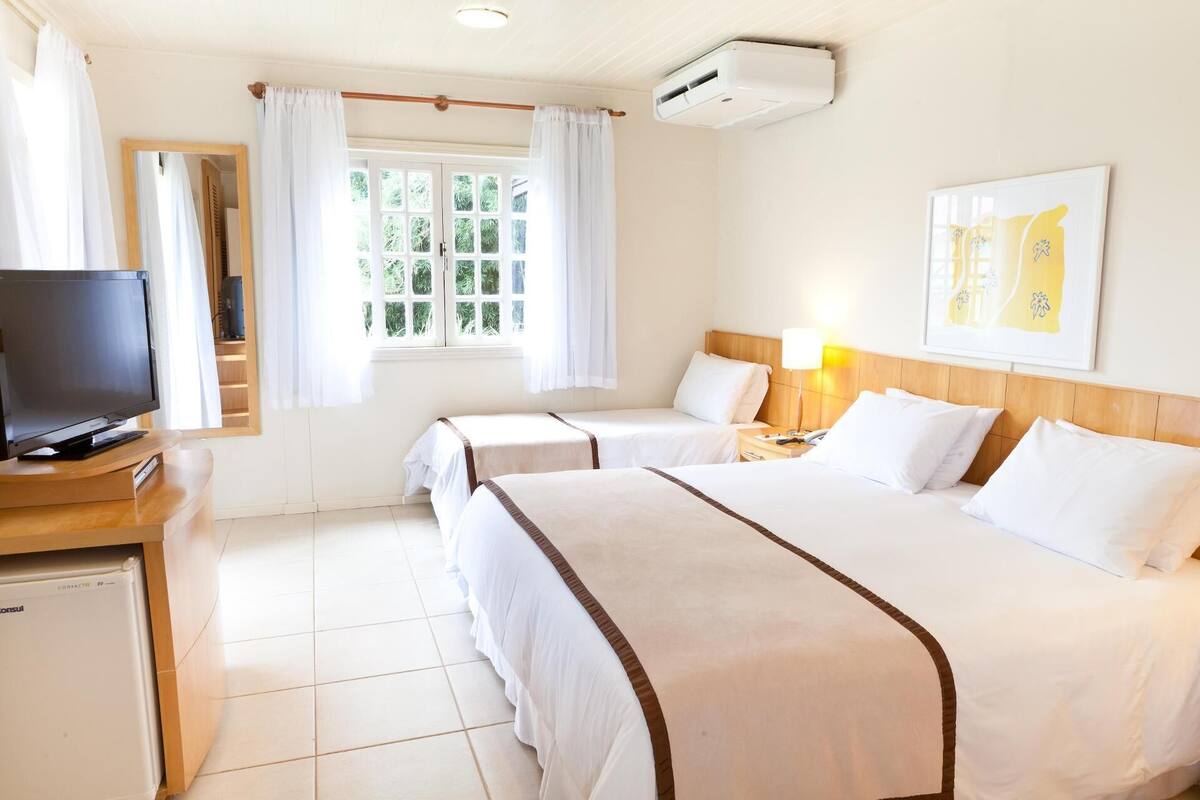 Hypo-allergenic bedding available, minibar, in-room safe