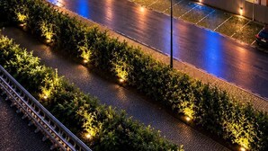 A hotel with a prominent sign, multiple floors, and a parking area. - LVG Hotel Collection - Bergamo West (Mozzo)