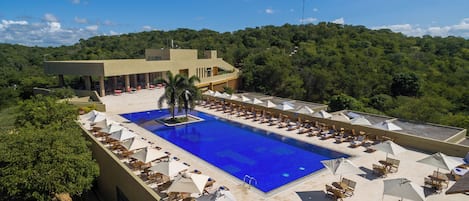 Outdoor pool, pool umbrellas, sun loungers