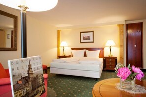 Premium bedding, pillow-top beds, minibar, in-room safe