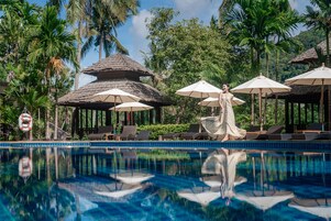 Outdoor pool, open 8:00 AM to 7:00 PM, pool umbrellas, sun loungers