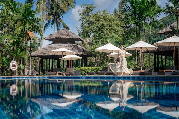 Outdoor pool, open 8:00 AM to 7:00 PM, pool umbrellas, pool loungers