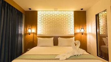 In-room safe, individually decorated, desk, blackout curtains
