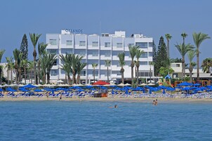 On the beach, sun loungers, beach umbrellas, beach bar