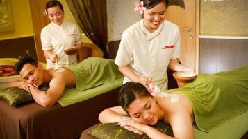 Experience soothing massages in a serene space with two comfortable massage tables and expert therapists.