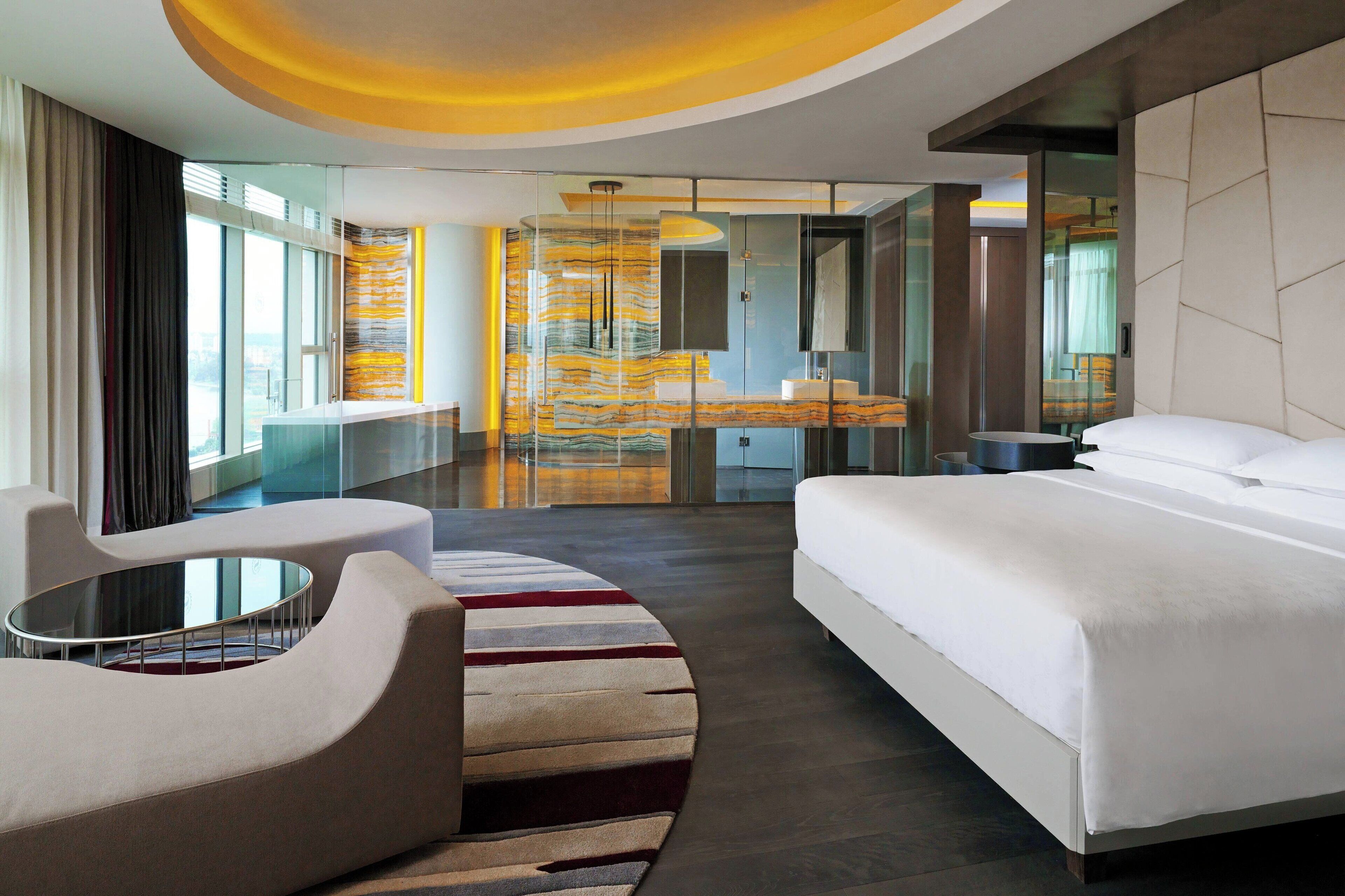 club suite, 1 king bed, river view | egyptian cotton sheets, premium bedding, down duvets, minibar