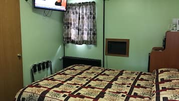 Standard Room, 1 Queen Bed | Bathroom | Shower, hair dryer, towels