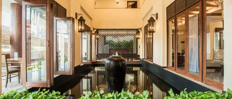 Indoor pool, open 7:00 AM to 6:00 PM, pool umbrellas, sun loungers