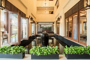 Indoor pool, open 7:00 AM to 6:00 PM, pool umbrellas, sun loungers