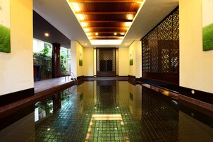 Indoor pool, open 7:00 AM to 6:00 PM, pool umbrellas, sun loungers