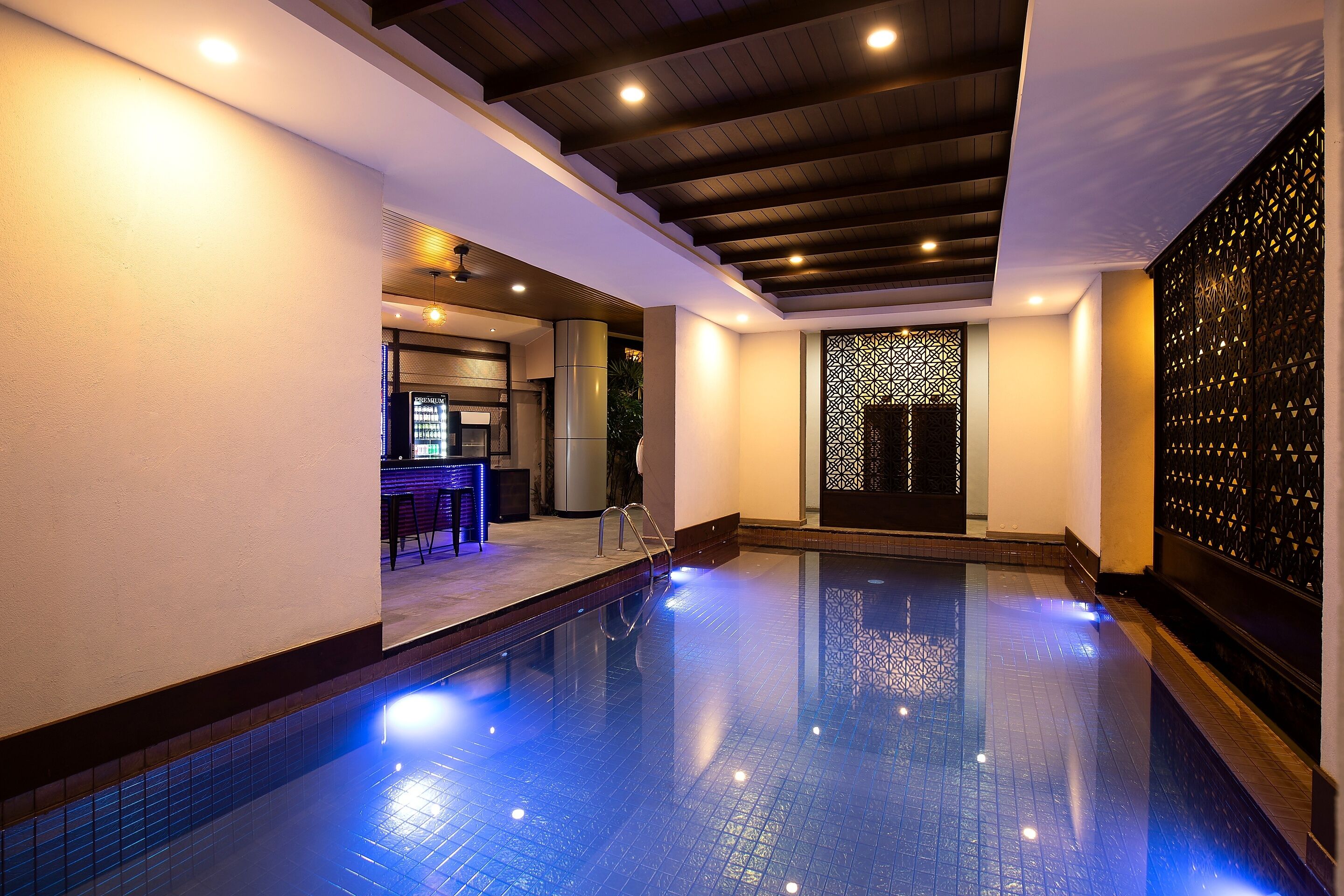 Indoor pool, open 7:00 AM to 6:00 PM, pool umbrellas, pool loungers