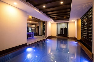 Indoor pool, open 7:00 AM to 6:00 PM, pool umbrellas, sun loungers