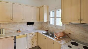 Family Duplex, 2 Bedrooms, Sea View | Private kitchen | Full-sized fridge, coffee/tea maker, electric kettle