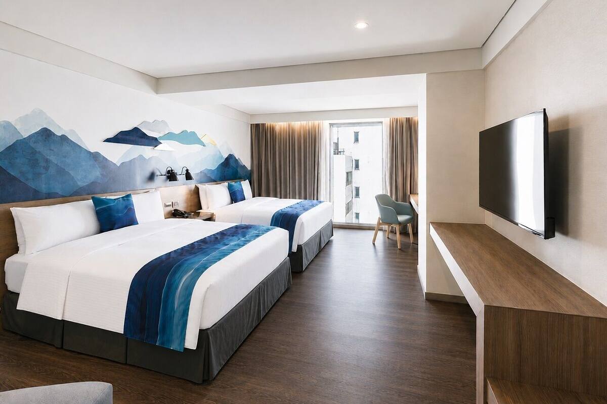 Deluxe Quadruple Room | In-room safe, desk, free WiFi, bed sheets