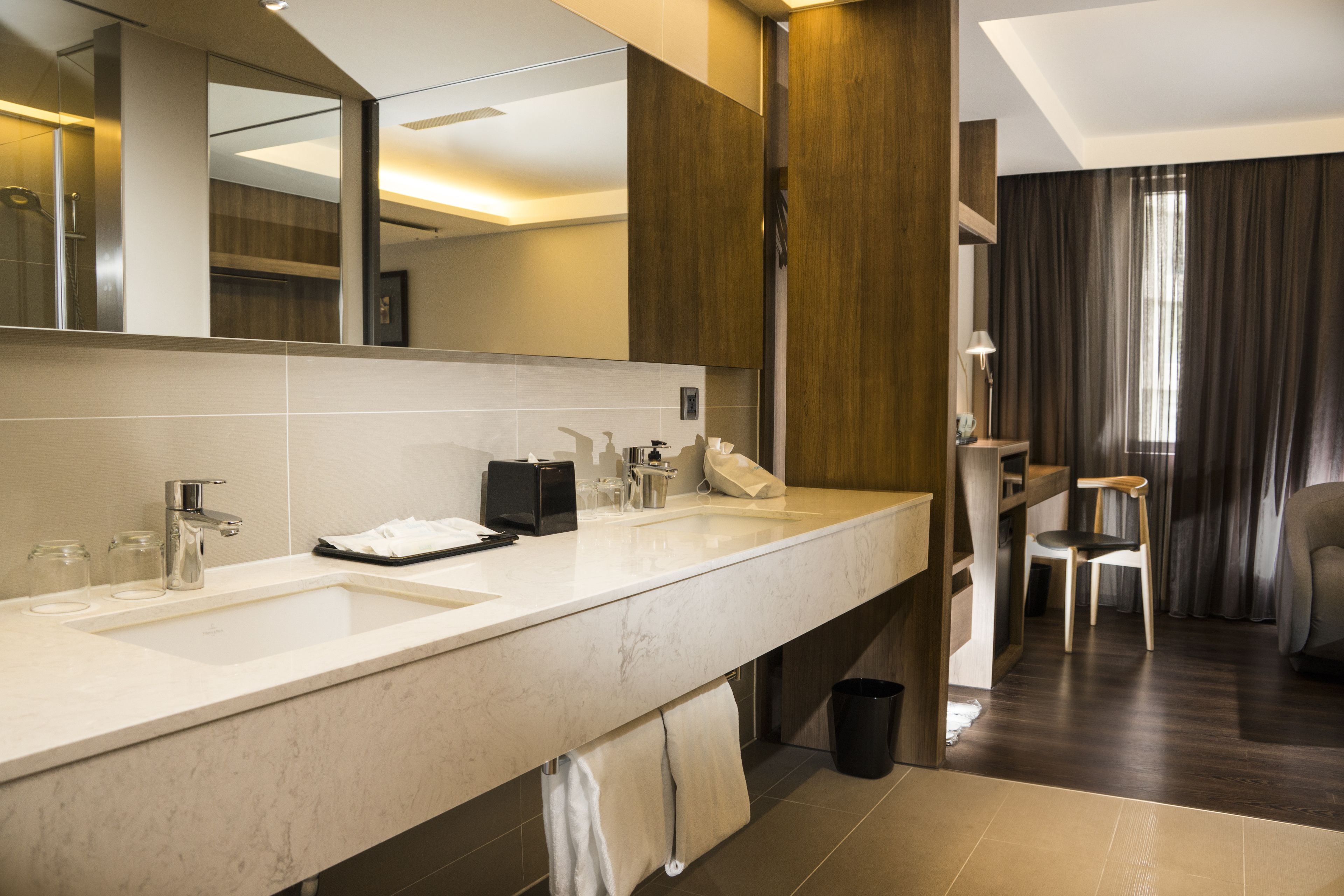 family suite | bathroom | shower, hair dryer, slippers, towels