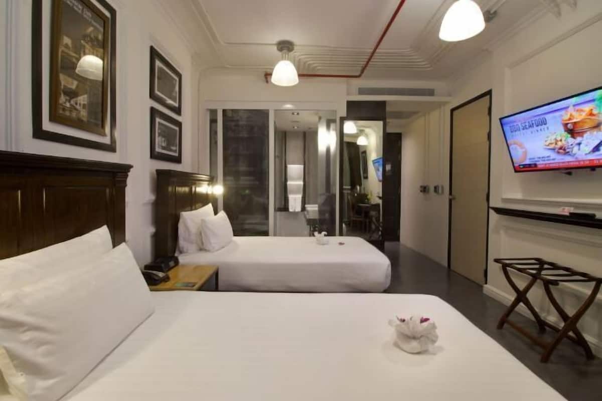 Ropa de cama de alta calidad y minibar