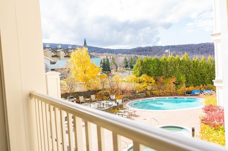 Condo, 2 Bedrooms | Pool | Outdoor pool, open 10:00 AM to 10:00 PM, sun loungers