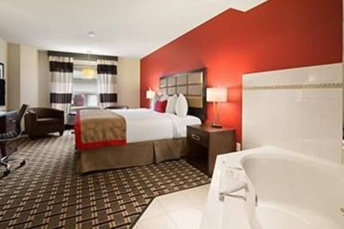 Desk, laptop workspace, blackout drapes, iron/ironing board