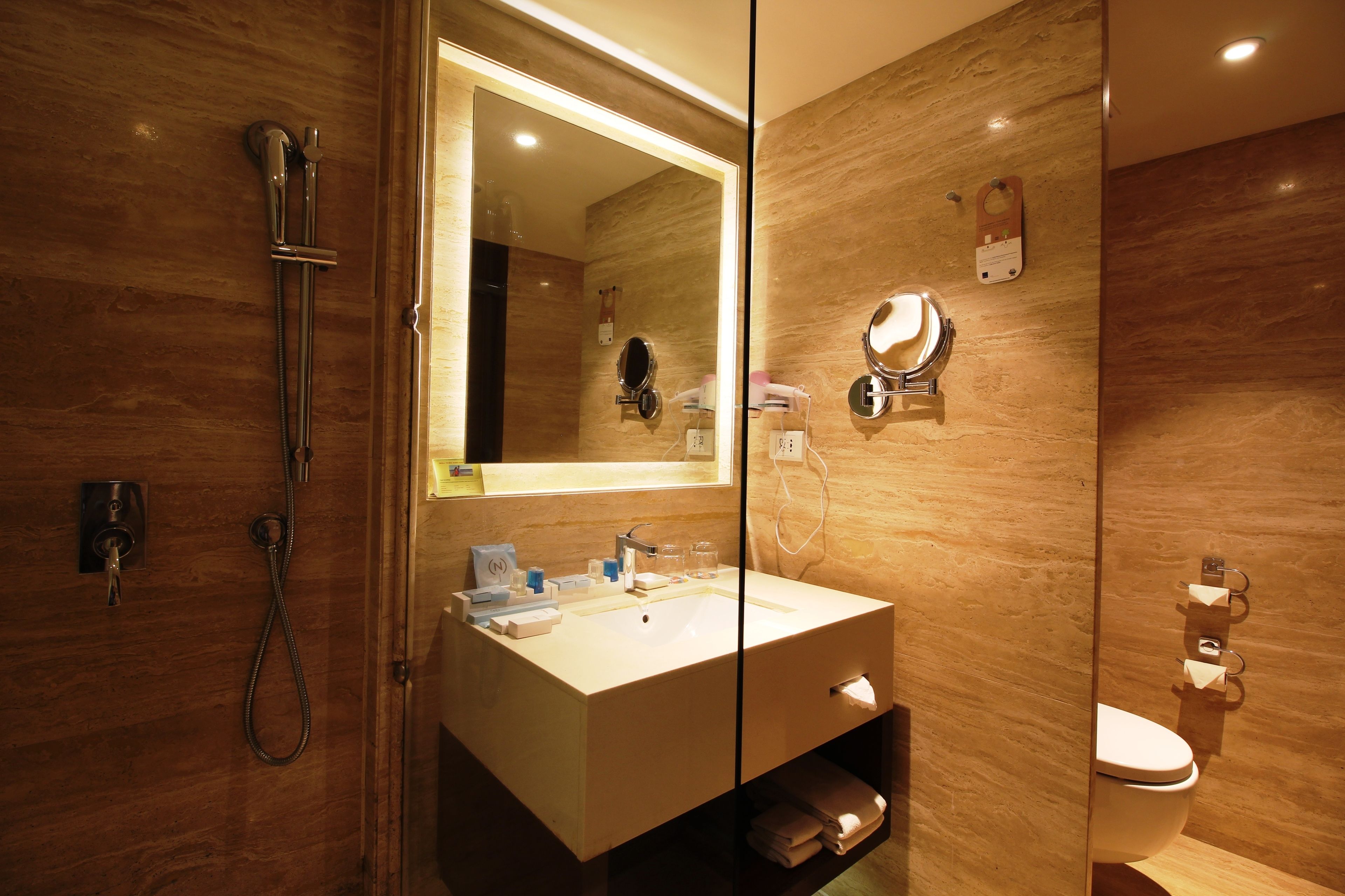 shower, rainfall showerhead, designer toiletries, hair dryer