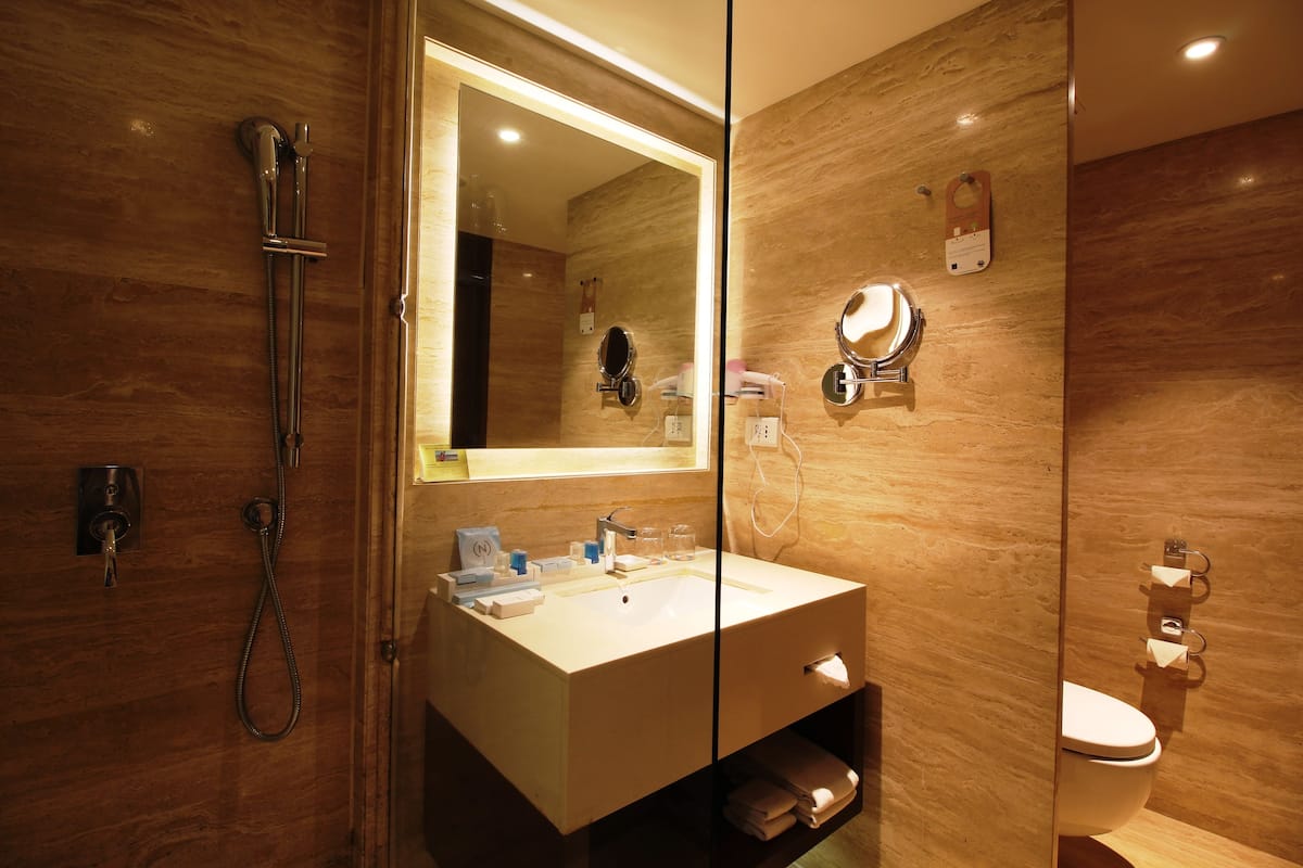 shower, rainfall showerhead, designer toiletries, hair dryer