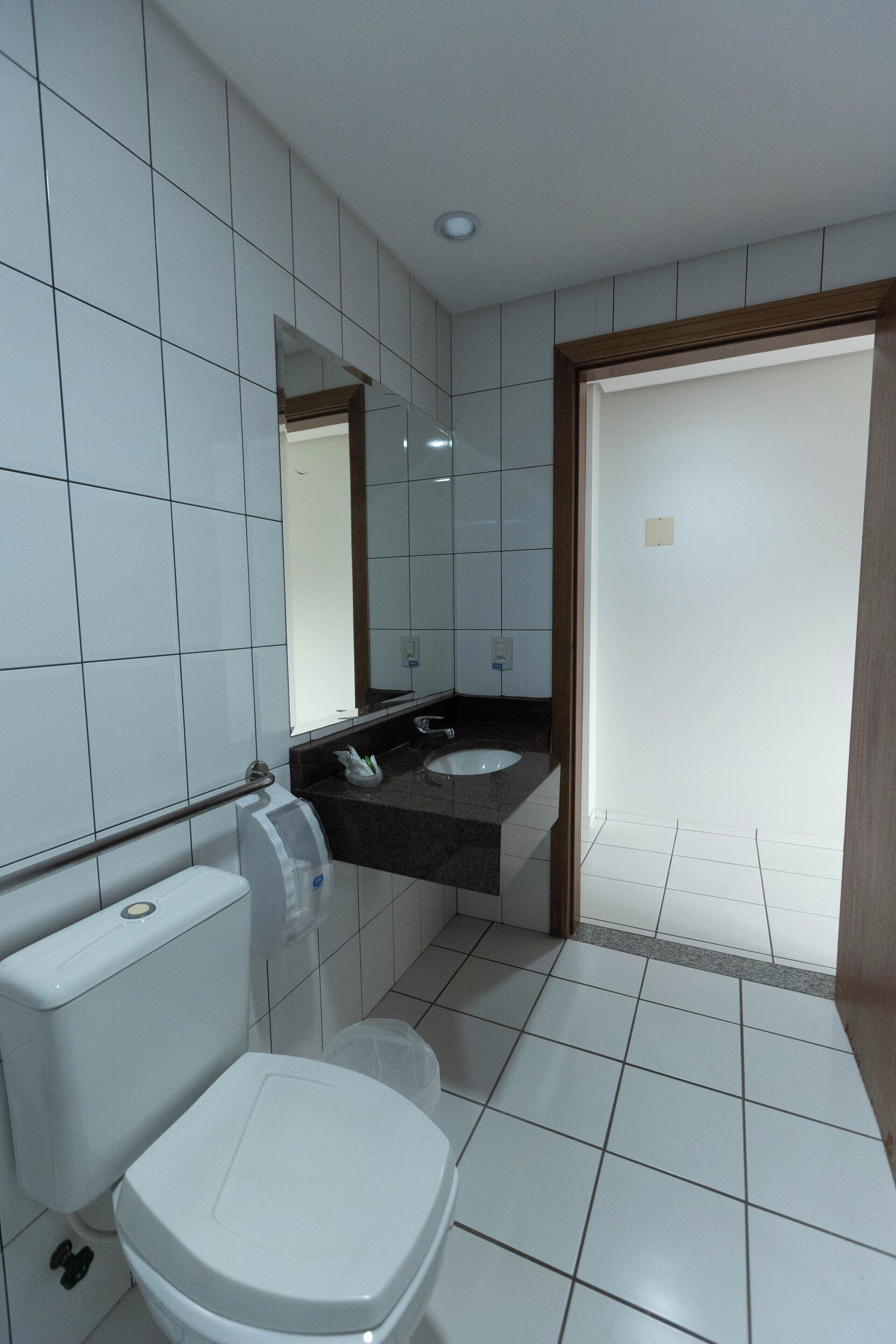 deluxe triple room | bathroom | shower, free toiletries, hair dryer, towels