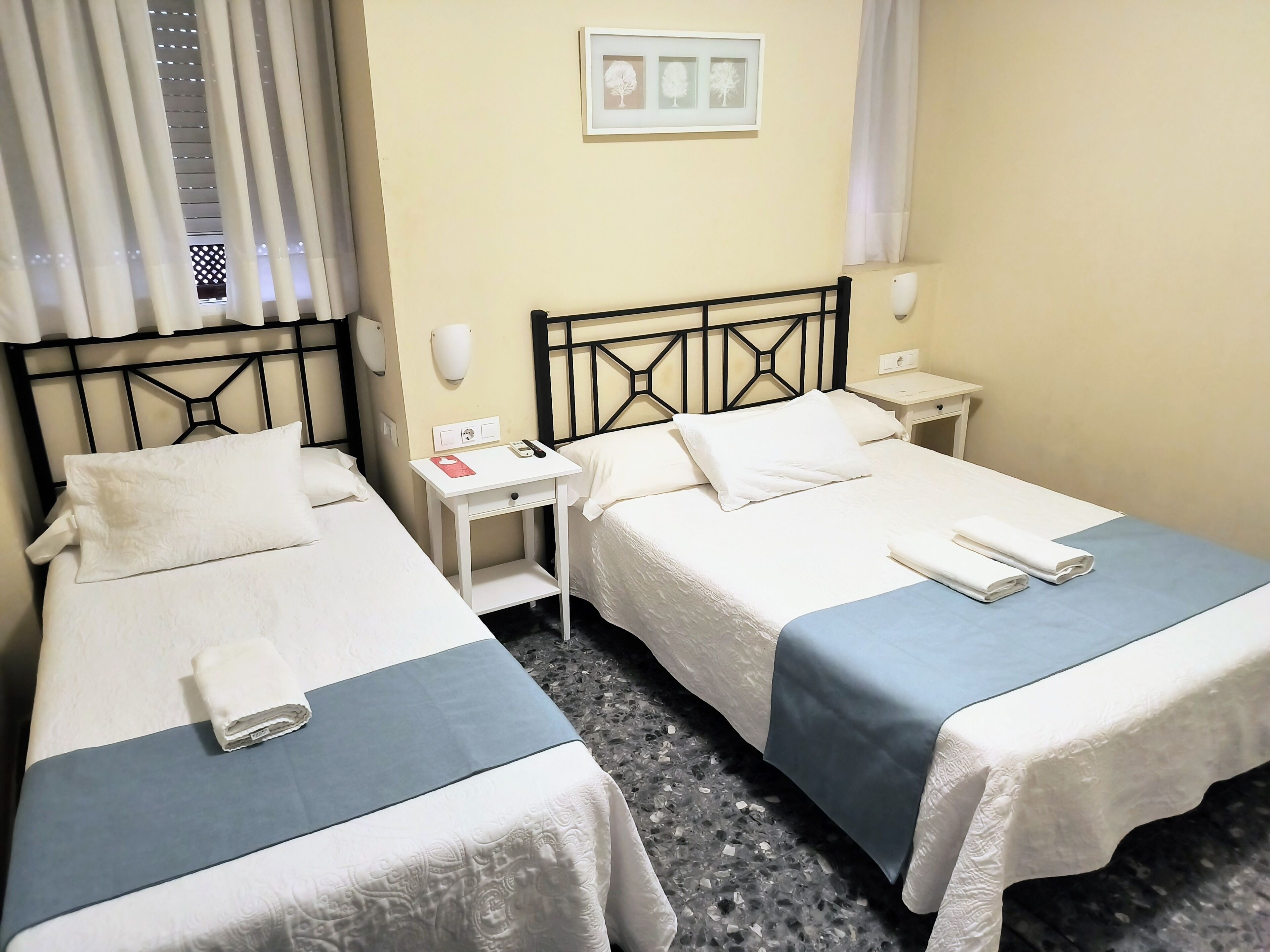 Triple Room, Multiple Beds, Private Bathroom | Free WiFi, bed sheets