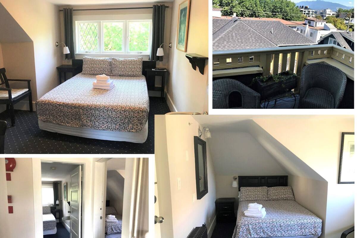 A hotel room with a bed, a window, a chair, and a view of the outside.