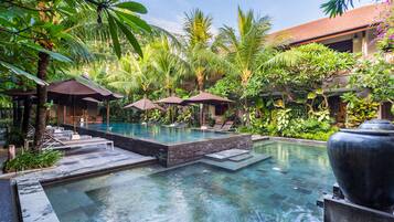 Outdoor pool, open 8:00 AM to 7:00 PM, pool umbrellas, pool loungers