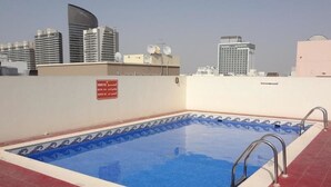 Indoor pool, outdoor pool - Premiere Hotel Apartments (Dubai)