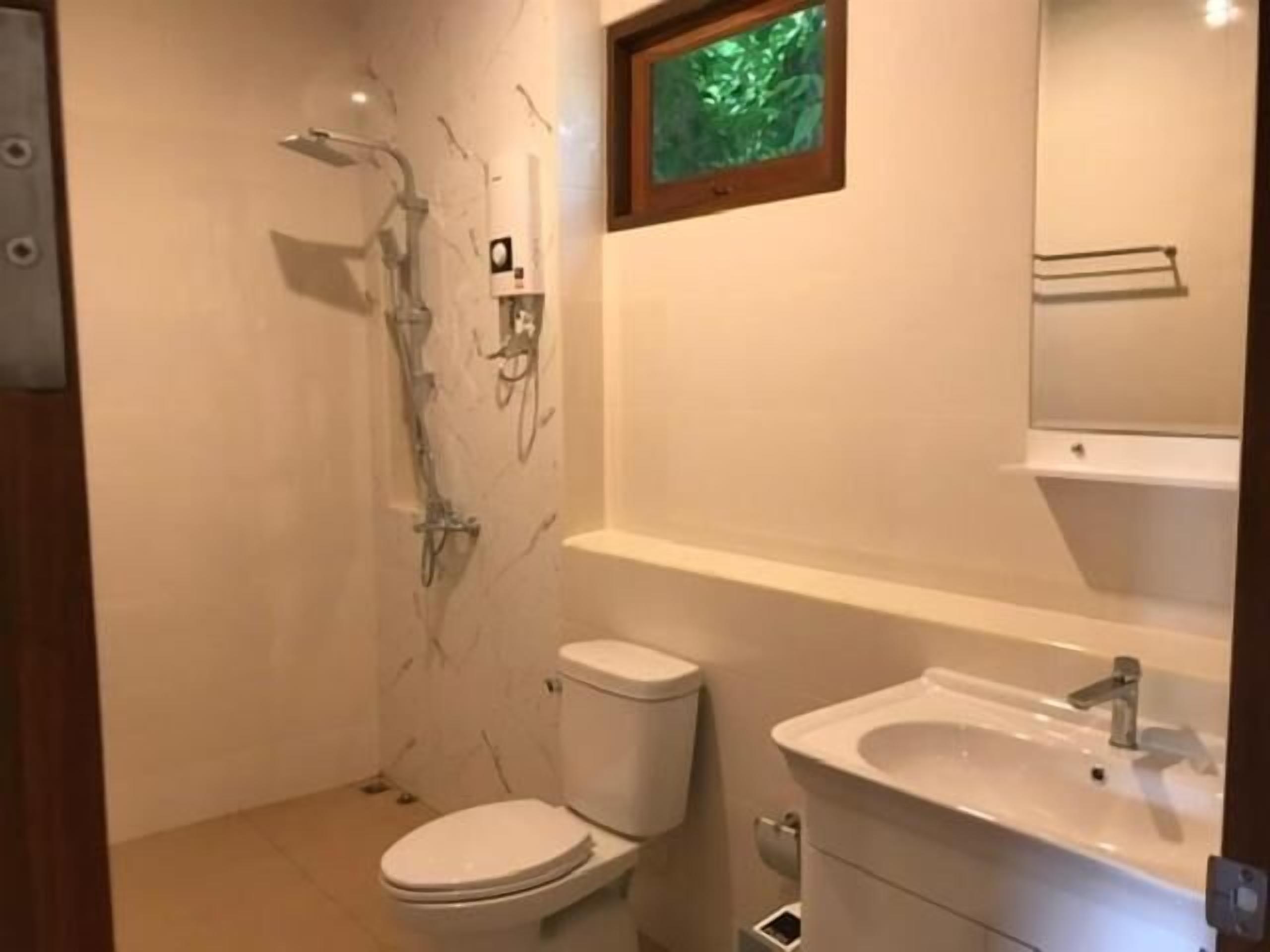 pool side villa | bathroom | bathtub, free toiletries, towels