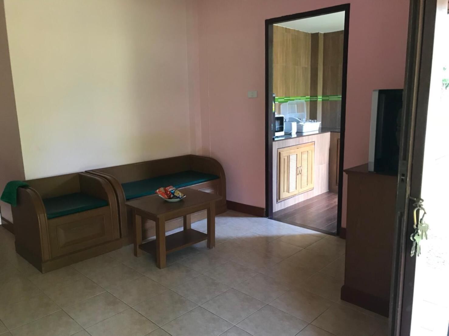 pool side villa | living room | tv