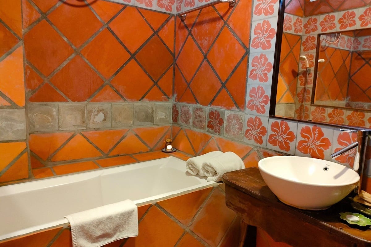 combined shower/bathtub, free toiletries, hair dryer, bathrobes