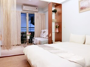 Standard Double Room | Premium bedding, pillowtop beds, individually decorated - Each Family (Kaohsiung)