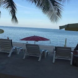 On the beach, sun loungers, beach umbrellas