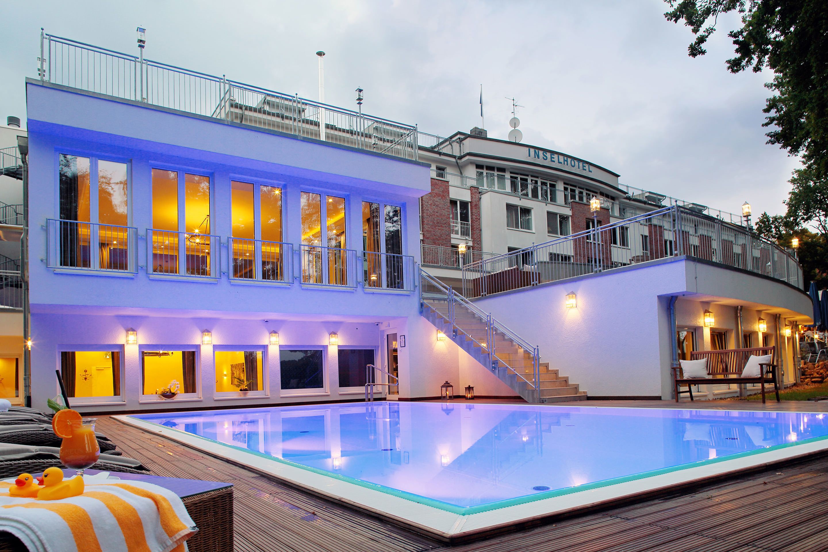 indoor pool, outdoor pool, open 7:00 am to 8:00 pm, pool umbrellas