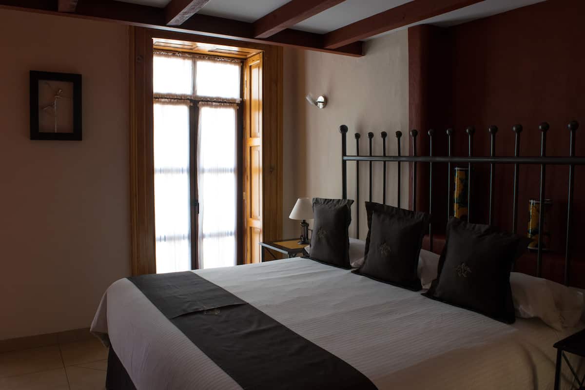 family room | in-room safe, blackout curtains, iron/ironing board, free wifi