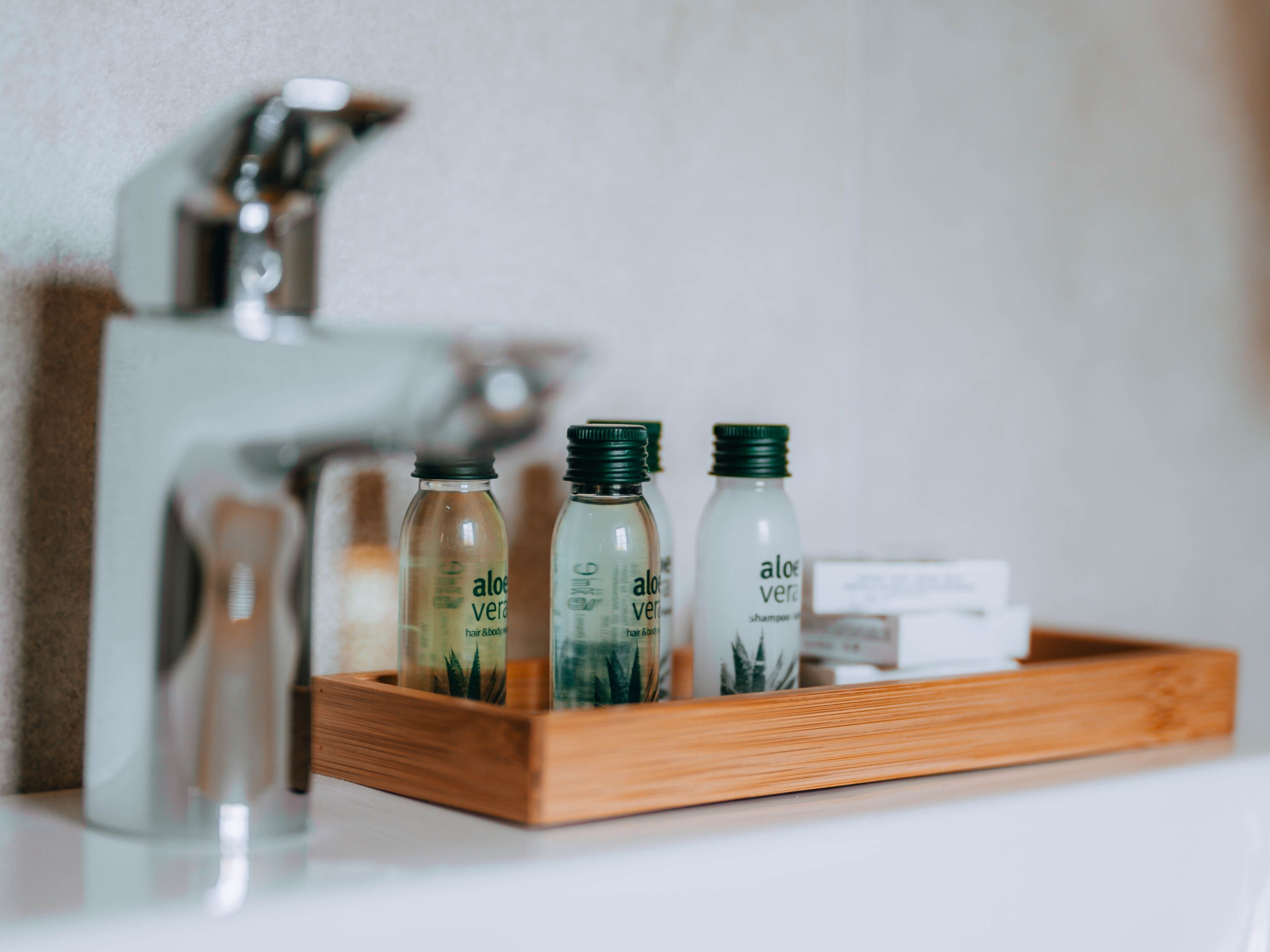 junior suite | bathroom | shower, free toiletries, hair dryer, towels