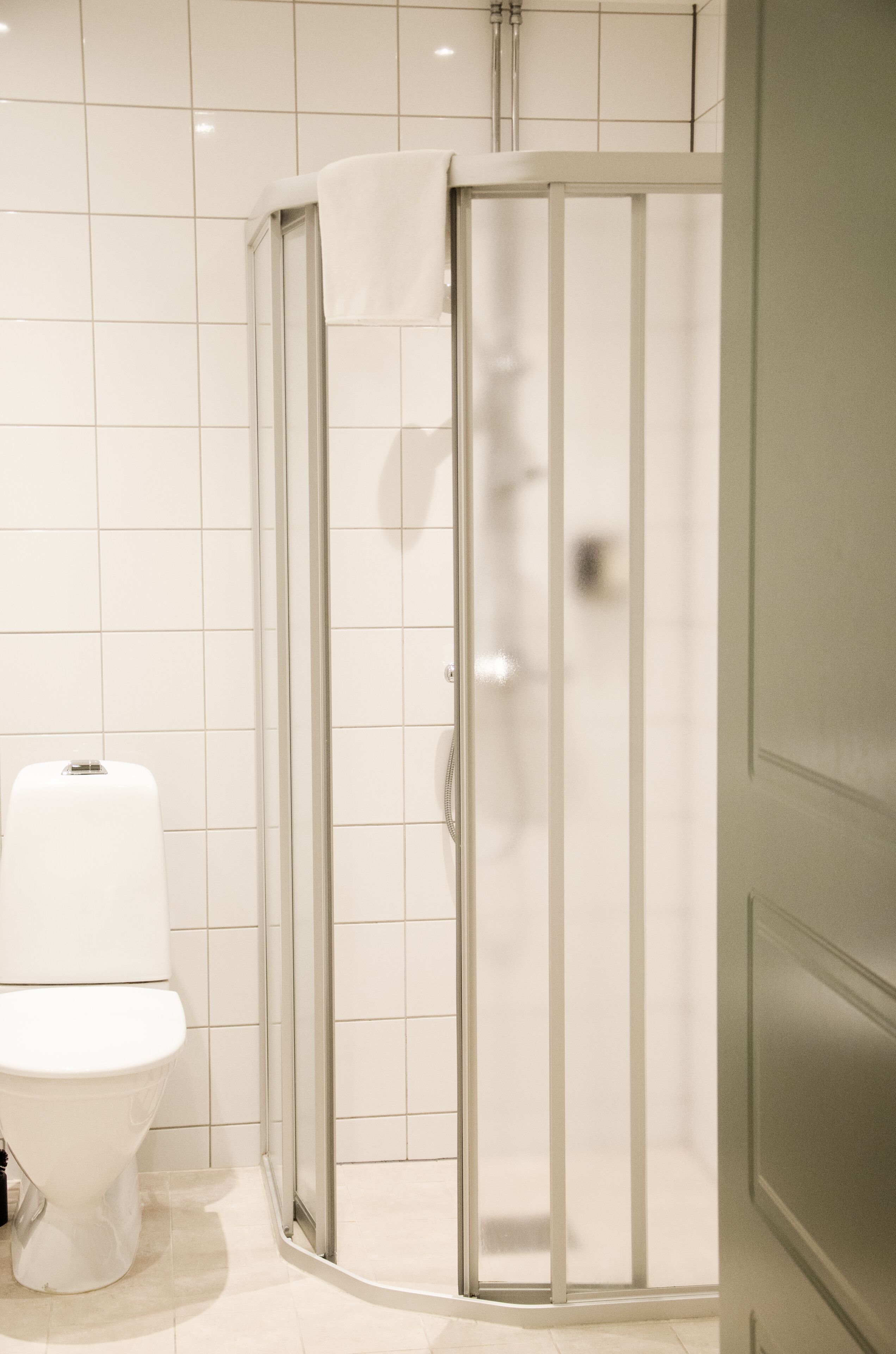 superior double room | bathroom | shower, free toiletries, hair dryer, towels