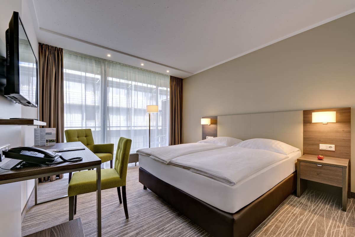 comfort double room | in-room safe, desk, blackout curtains, iron/ironing board