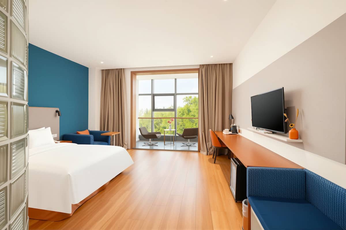 Standard Room, 1 Queen Bed, Balcony (Extra Space) | In-room safe, desk, soundproofing, cribs/infant beds