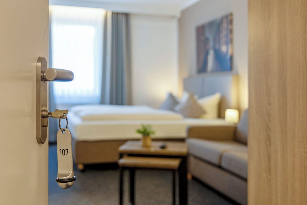 Comfort Triple Room, 1 Double Bed with Sofa bed, Non Smoking, Courtyard View | In-room safe, blackout drapes, soundproofing