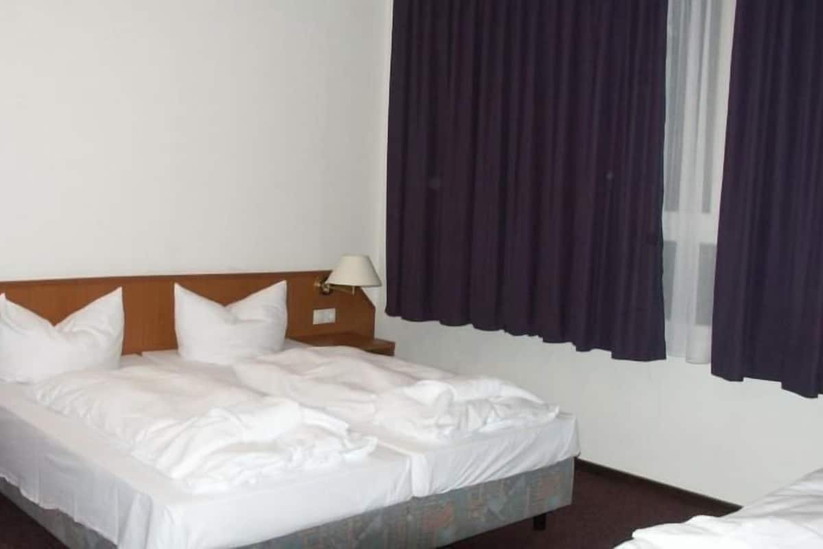 Desk, blackout drapes, iron/ironing board (on request), WiFi (free)