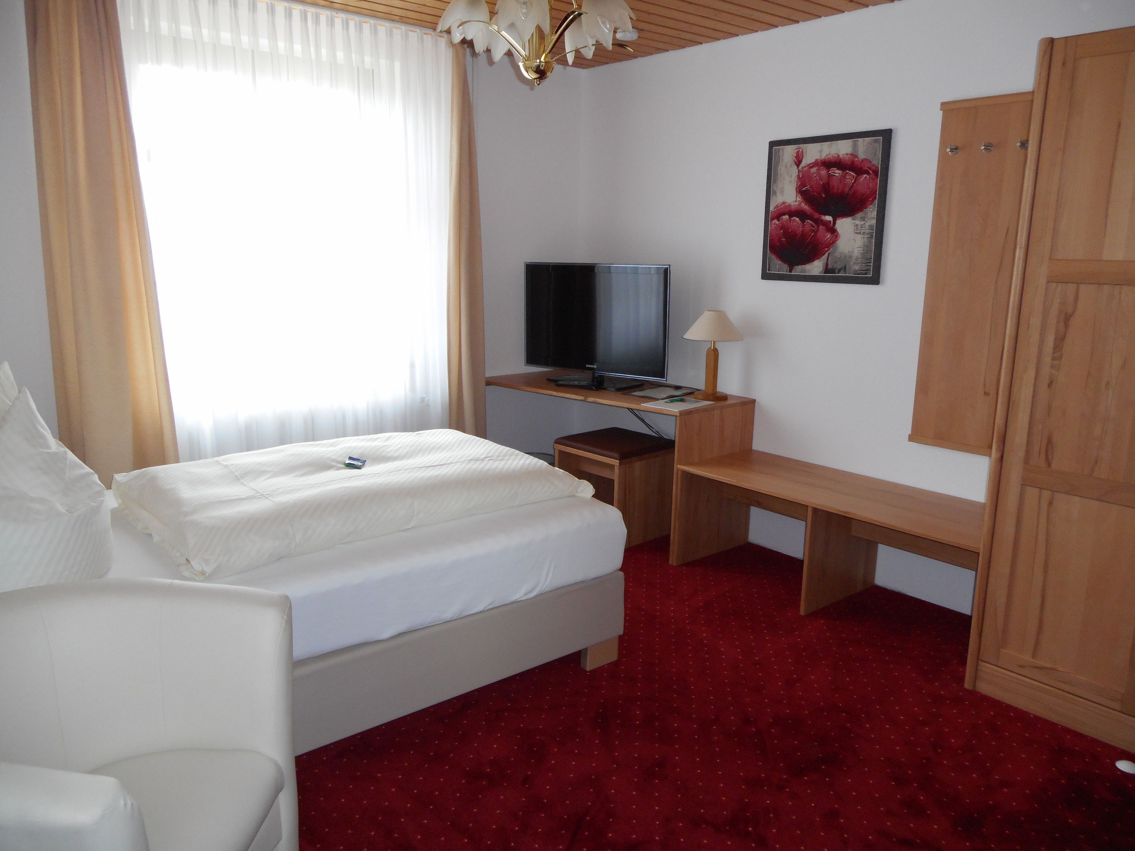 classic single room, annex building | in-room safe, desk, free wifi, bed sheets