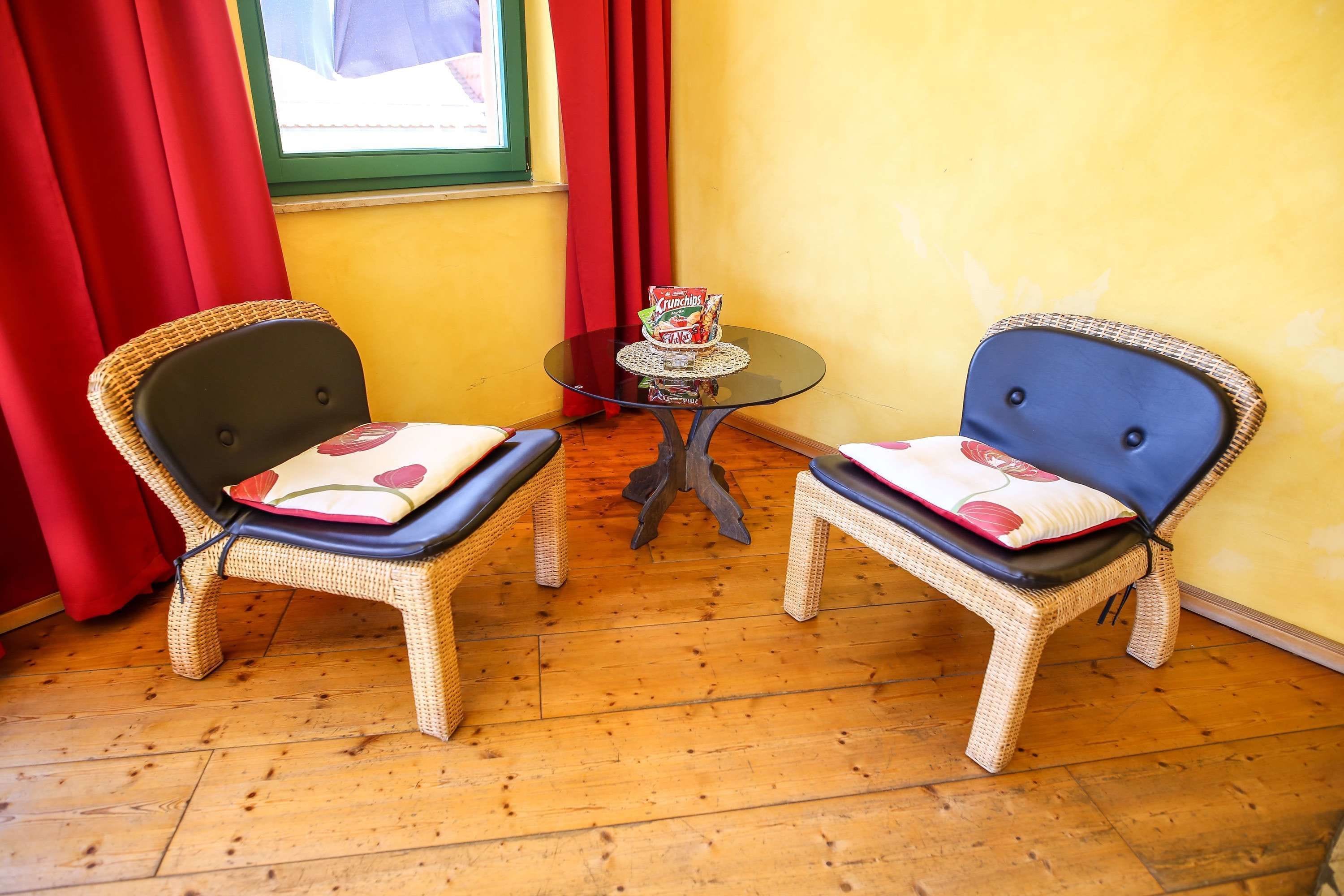 double room, balcony | living area | flat-screen tv