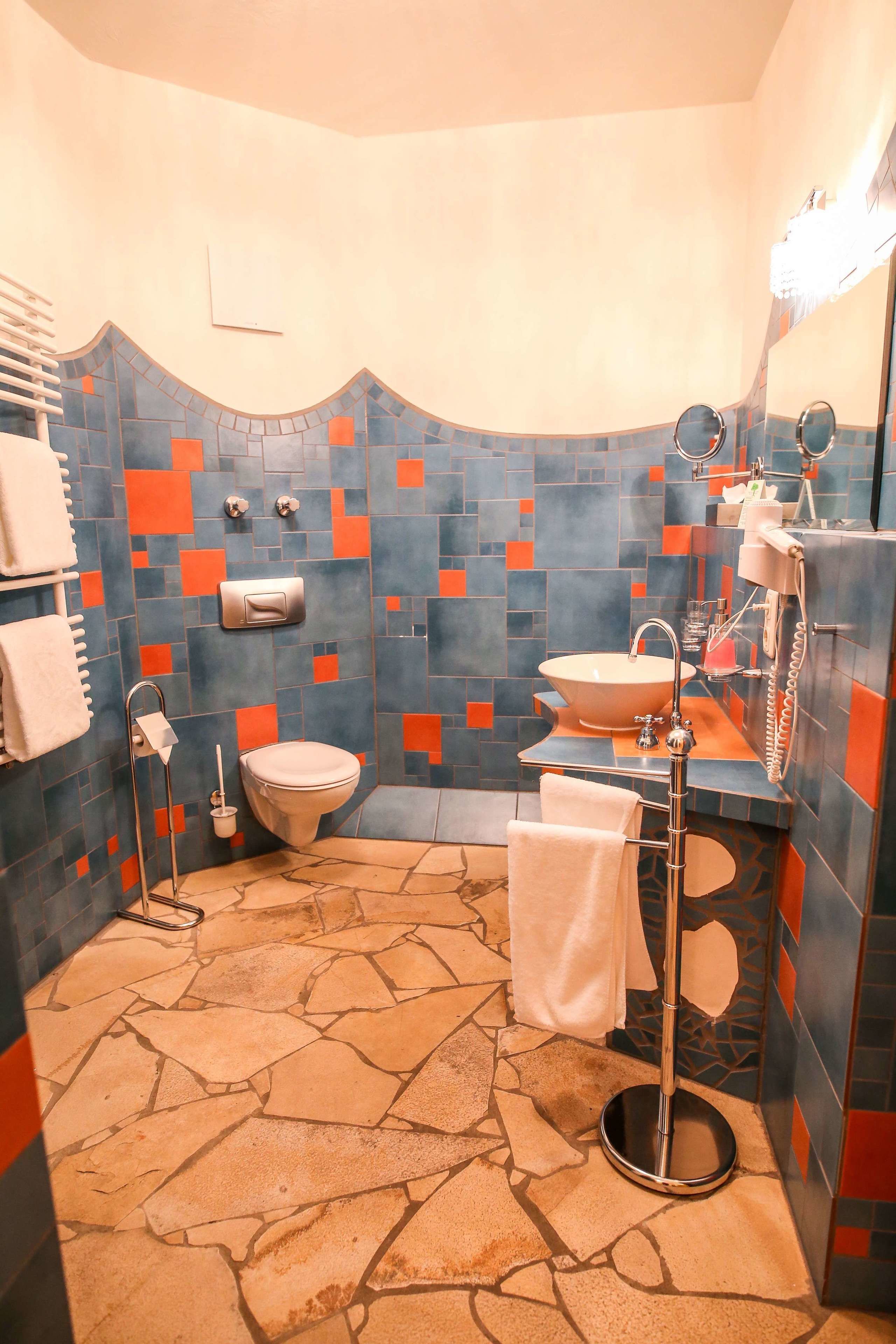 junior suite | bathroom | shower, rainfall showerhead, free toiletries, hair dryer
