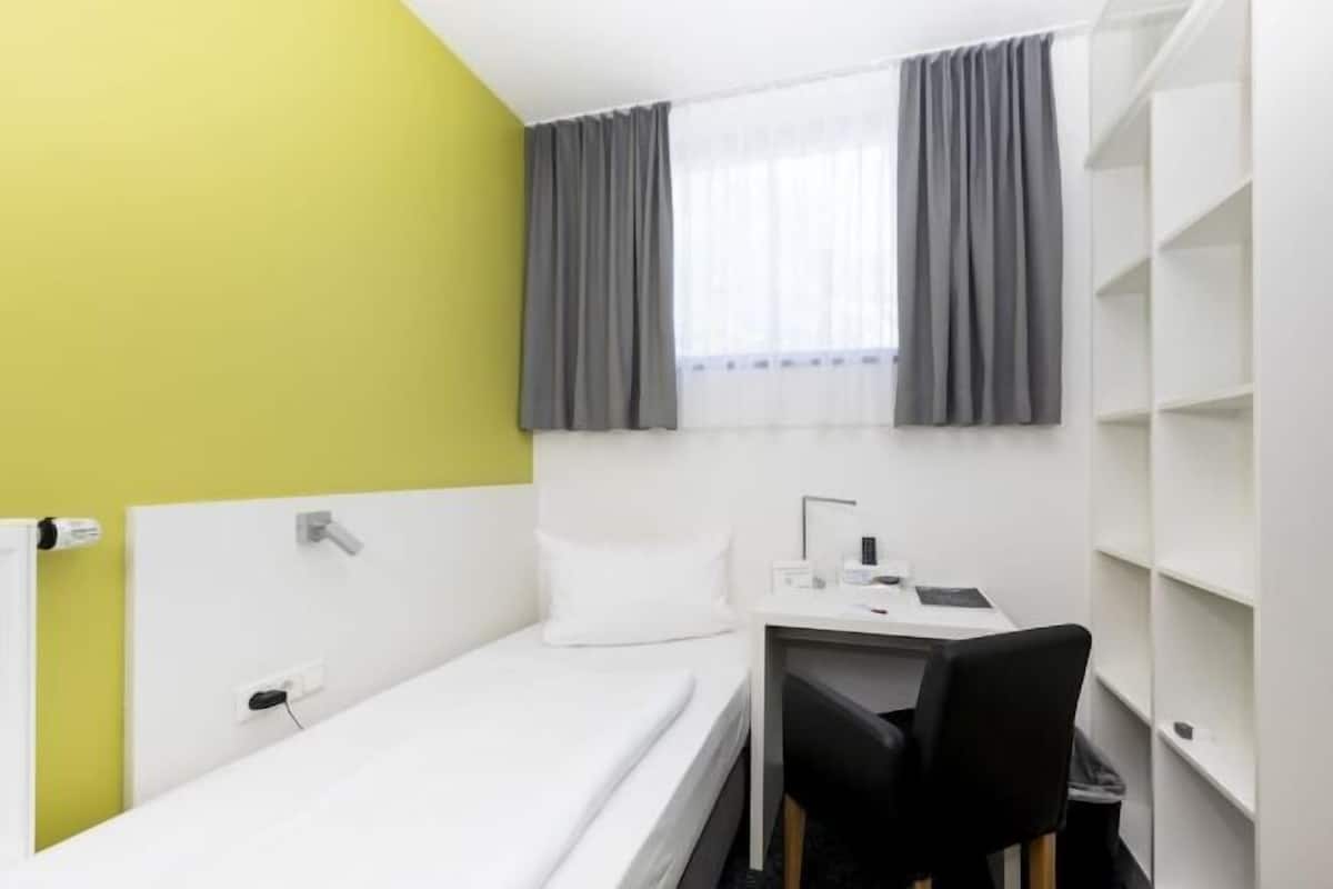 Hypo-allergenic bedding, desk, blackout curtains, iron/ironing board